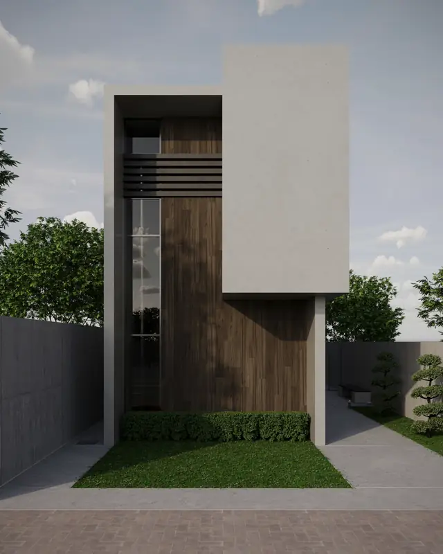 Narrow three-storey terrace house with a timber-clad stair tower, a pale concrete side wall and a front lawn