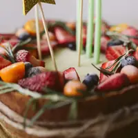 Strawberry and berry-topped cake