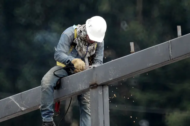 Welder on a steel beam