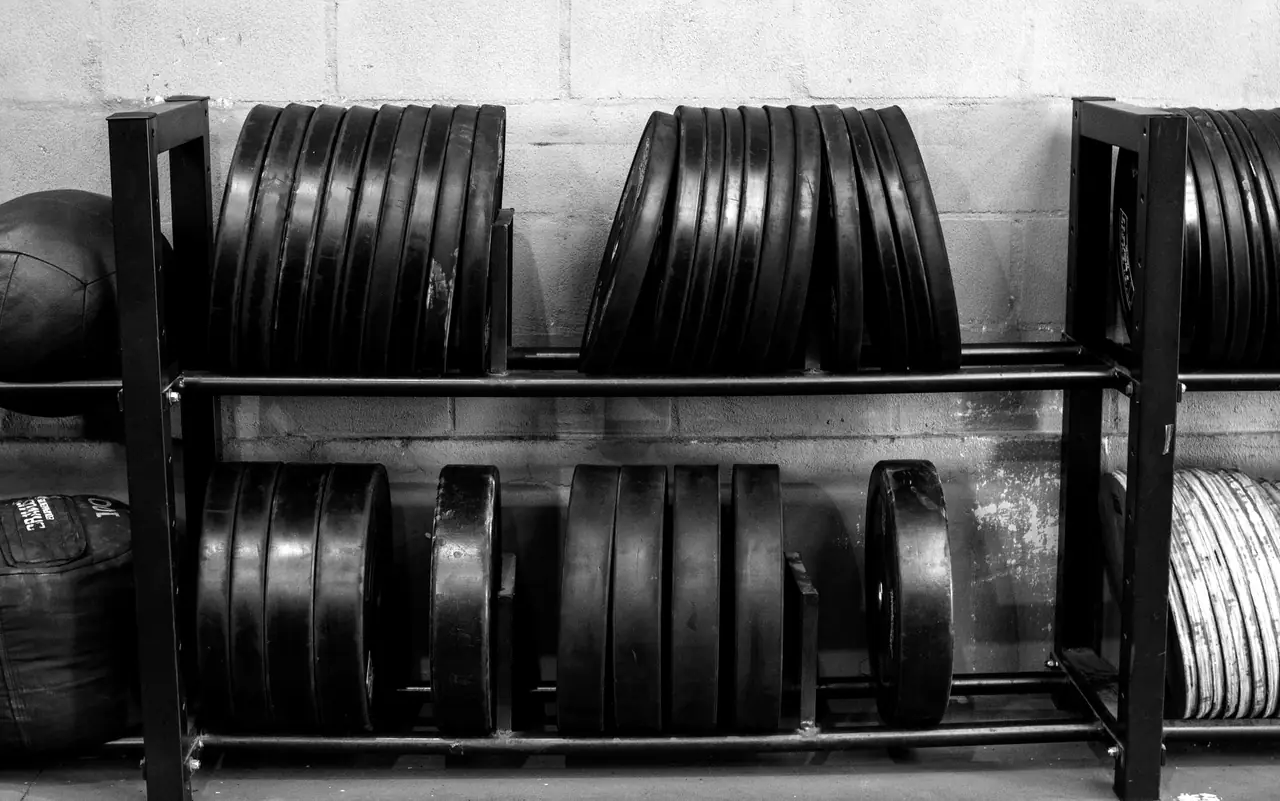 Plate racks against the block wall of the studio